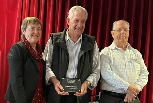 Larry Langford receiving his plaque from Christine Pitcher and Dennis Brown.